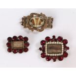 19th Century mourning jewellery, to include a hair, pearl and garnet brooch inscribed to the reverse