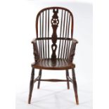 19th Century Thames Valley beech ash and elm Windsor elbow chair, the pierced wheel back flanked