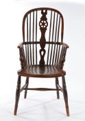 19th Century Thames Valley beech ash and elm Windsor elbow chair, the pierced wheel back flanked