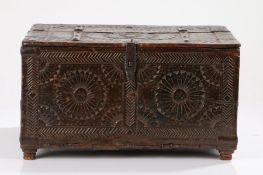 17th Century Spanish chip carved casket, the hinged lid decorated with a circular motif and