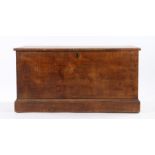 19th Century scumbled pine blanket box, the hinged lid opening to reveal a lidded candle box, on a