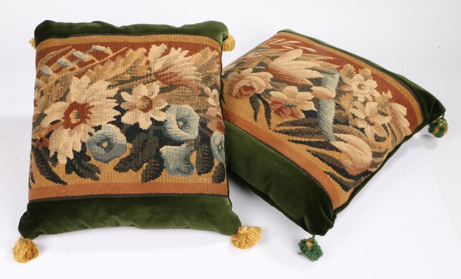 A near pair of cushions of Aubusson tapestry, of floral design set within green cotton velvet,