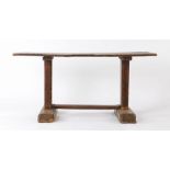 An 18th Century and later Tavern type table pine and elm table, the rectangular top with rounded