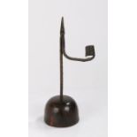English rush light and candle holder, circa 1800, the wrought iron arm with candlestick socket above