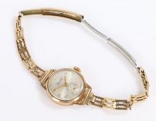 Accurist gold plated ladys wristwatch, with a subsidiary seconds dial