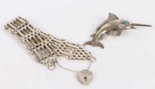 Silver gate bracelet together with a brooch depicting a sword fish with turquoise eye (2)