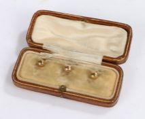Three 10 carat gold collar studs, gross weight 1.7 grams