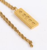 9 carat gold ingot, attached to a chain, the ingot,32 grams, the chain 10 grams