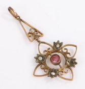 9 carat gold art nouveau garnet and pearl pendant in the form of star, gross weight 1.8 grams