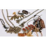 Collection of costume jewellery to include necklaces and bracelets housed in a box (Qty)