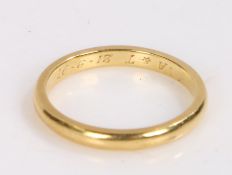 Unmarked gold coloured metal wedding band, the interior with initials and date '97, ring size I 1/2,