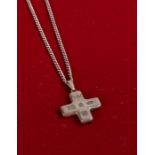 Silver pendant and chain in the form of a cross, marked Sheffield gross weight 13.8 grams