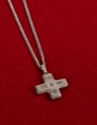 Silver pendant and chain in the form of a cross, marked Sheffield gross weight 13.8 grams