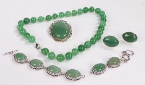 Collection of jade jewellery to include a necklace, brooch, cuff links and a bracelet (5)