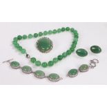 Collection of jade jewellery to include a necklace, brooch, cuff links and a bracelet (5)