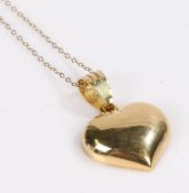 18 carat gold heart form pendant, 3.7g, on a gold coloured metal necklace necklace, 0.9g