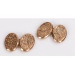 Pair of 9 carat gold cufflinks, with foliate decorated oval links, 3.3g