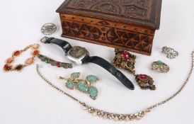 Collection of costume jewellery to include a rotory watch bracelets ect housed in a wooded box