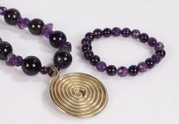 Amethyst bead necklace with white metal roundel pendant, similar amethyst bead bracelet (2)