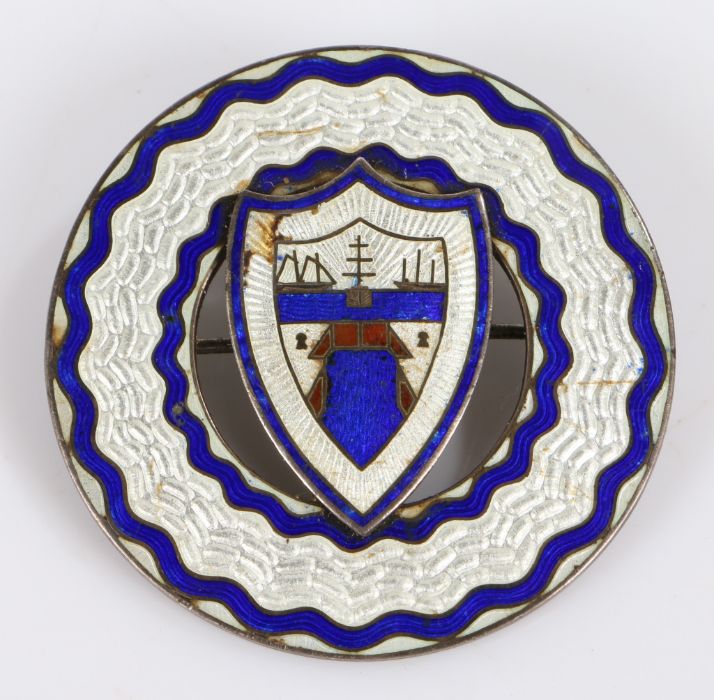 Silver blue and white enamel brooch depicting a coat of arms