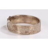 Silver bangle with foliate decoration, gross weight 26.4 grams