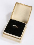 18 carat gold, platinum and diamond ring, set with three diamonds, ring size M, 2.2g