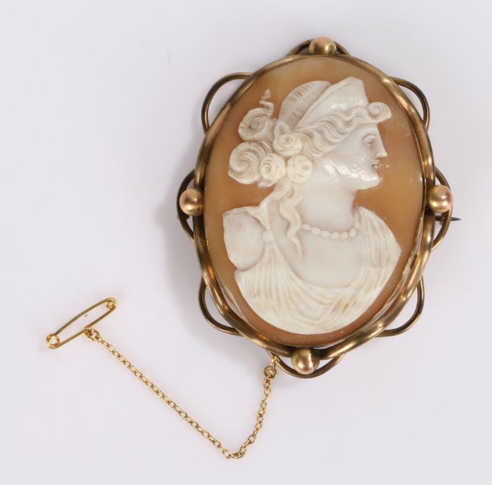 Cameo brooch, of large size, carved with a classical figure, 75mm long