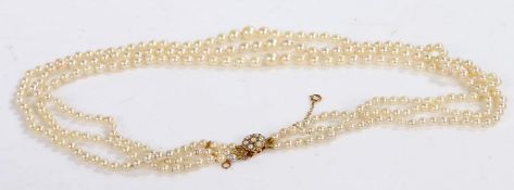 Simulated pearl necklace with a 9 carat gold clasp, three rows of pearls