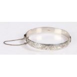 Silver bangle decorated with a floral design, Birmingham 1972, gross weight 24.5 grams