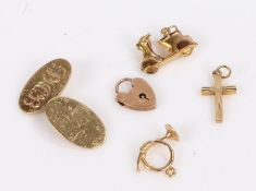 9 carat gold, to include a single cufflink, a Vespa charm, a padlock and a cross, 6.6 grams,