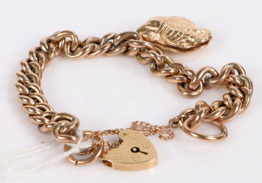 9 carat gold charm bracelet, with an attached 9 carat gold charm, 17.7 grams