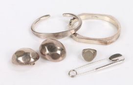 Collection of silver items to include a torc, bangle, pair if clip on earrings, signet ring and a
