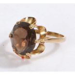 9 carat gold ring set with a brown stone, ring size P gross weight 3.1 grams