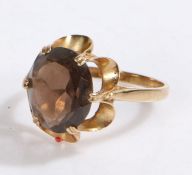 9 carat gold ring set with a brown stone, ring size P gross weight 3.1 grams