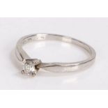 18 carat white gold diamond set solitaire ring, the round cut diamond at an estimated 0.20 carat,