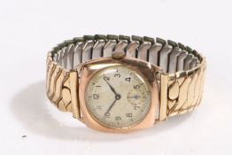 9 carat gold ladies wristwatch, the silver dial with Arabic numerals and subsidiary seconds dial,