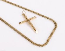 9 carat gold crucifix on a yellow metal chain, gross weight of crucifix 2.0 grams