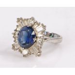 9 carat white gold ring, set with a faux sapphire and paste diamond effect surround, ring size K