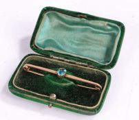 9 carat gold bar brooch, set with oval blue paste stone, 6cm wide, 3.2 grams