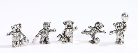 Five silver plated model teddy bears, to include example holding a balloon, kicking a ball,