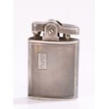 Ronson silver cigarette lighter, the engine turned body with rectangular cartouche initialled GSC