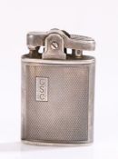 Ronson silver cigarette lighter, the engine turned body with rectangular cartouche initialled GSC