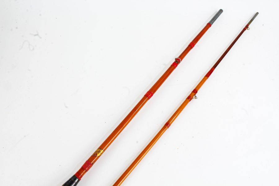 Allcocks four piece split cane fishing rod, with cork handle and carrying bag