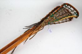 Two wooden lacrosse sticks, one stamped 'Hattersley, Viktoria; (2)