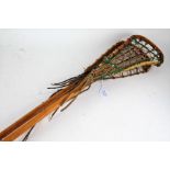 Two wooden lacrosse sticks, one stamped 'Hattersley, Viktoria; (2)