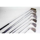 Set of Ping Eye 2 irons, black dot, Numbers 4-8 and wedge, plus a Ping Anser putter (replaced