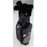 King Cobra golf bag. housing Grand Slam clubs by Hillerich & Bradsby Co., with various drivers (