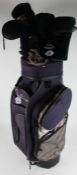 King Cobra golf bag. housing Grand Slam clubs by Hillerich & Bradsby Co., with various drivers (