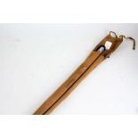 Allcocks light caster two piece spit cane fishing rod, with carrying bag