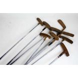 Collection of eleven brass head putters, to include Golden Goose by John Letters, Golden Eagle by